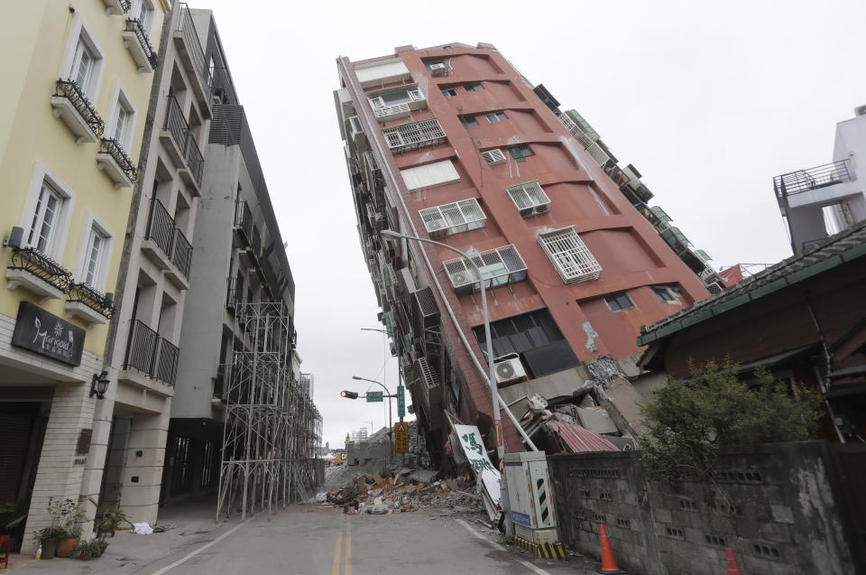 A building is seen partially collapsed, two days after a powerful earthquake struck the city, in Hualien City, eastern Taiwan, Friday, April 5, 2024. Rescuers searched Thursday for missing people and worked to reach hundreds stranded when Taiwan's strongest earthquake in 25 years sent boulders and mud tumbling down mountainsides, blocking roads. (AP Photo/Chiang Ying-ying)