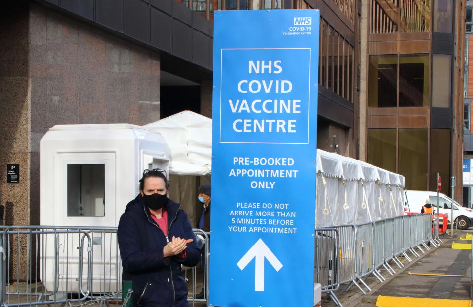  A woman wearing a face facemask checks into the vaccination centre.
A steady stream of elderly people with pre-booked appointments at the new Covid-19 Vaccination hub at the�Olympic Office Centre, near London's Wembley Stadium. It is one of 10 new large scale Vaccination centres opened this week, to join the seven already in use across the country. So far 4.9 million people across the UK have received the first dose of vaccine and the government aims for that number to rise to 15 million by 15 February. (Photo by Keith Mayhew / SOPA Images/Sipa USA) 