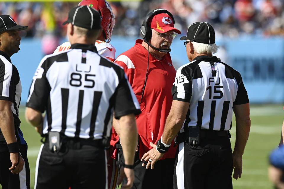 Kansas City Chiefs head coach Andy Reid argues with field judge Rick Patterson (15) in the second half of an NFL football game against the Tennessee Titans Sunday, Oct. 24, 2021, in Nashville, Tenn. (AP Photo/Mark Zaleski)