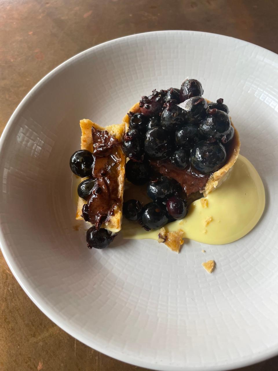 Chocolate & urfa tart with local blueberries from Adam's Berry Farm and pomegranate molasses.