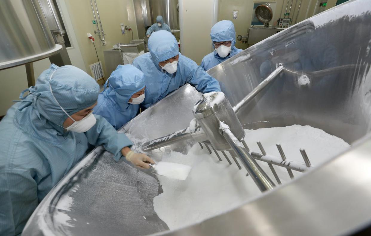 <span class="caption">Employees work on the production line of chloroquine phosphate, resumed after a 15-year break, in a pharmaceutical company in Nantong city in east China's Jiangsu province Thursday, Feb. 27, 2020. </span> <span class="attribution"><a class="link " href="https://www.gettyimages.com/detail/news-photo/employees-work-on-the-production-line-of-chloroquine-news-photo/1203673365?adppopup=true" rel="nofollow noopener" target="_blank" data-ylk="slk:Feature China/Barcroft Media via Getty Images;elm:context_link;itc:0;sec:content-canvas">Feature China/Barcroft Media via Getty Images</a></span>