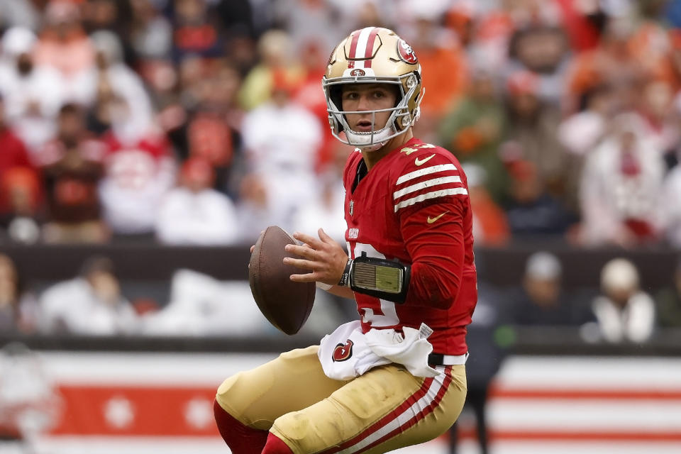 San Francisco 49ers quarterback Brock Purdy (13) looks to throw the ball during an NFL football game against the Cleveland Browns, Sunday, Oct. 15, 2023, in Cleveland. (AP Photo/Kirk Irwin)