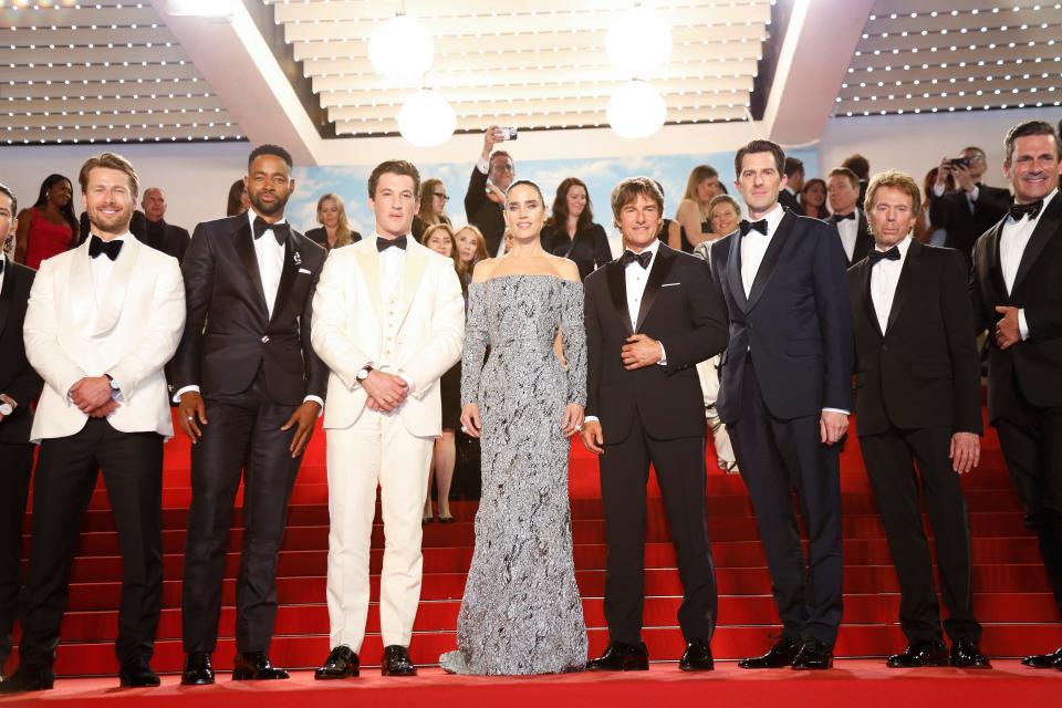 The cast and crew of Top Gun Maverick on the steps at the Cannes Film Festival