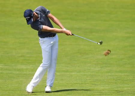 Jun 16, 2018; Southampton, NY, USA; Daniel Berger hits from the fairway on the eighteenth hole during the third round of the U.S. Open golf tournament at Shinnecock Hills GC - Shinnecock Hills Golf C. Dennis Schneidler-USA TODAY Sports