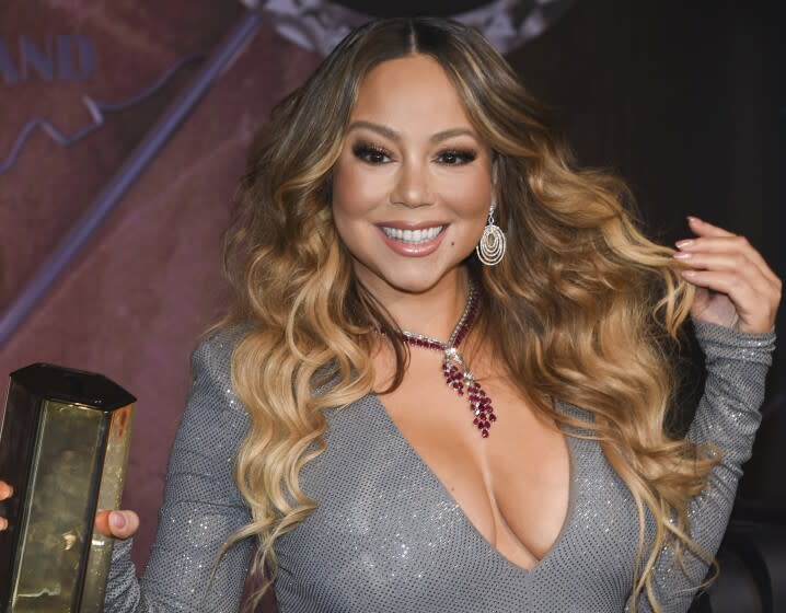 Singer Mariah Carey participates in the ceremonial lighting of the Empire State Building to commemorate the 25th anniversary of the release of her single "All I Want For Christmas Is You" on Tuesday, Dec. 17, 2019, in New York. (Photo by Evan Agostini/Invision/AP)