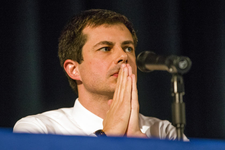 Democratic presidential candidate and South Bend Mayor Pete Buttigieg looks on during a town hall community meeting, Sunday, June 23, 2019, at Washington High School in South Bend, Ind. Buttigieg faced criticism from angry black residents at the emotional town hall meeting, a week after a white police officer fatally shot a black man in the city. (Robert Franklin/South Bend Tribune via AP)