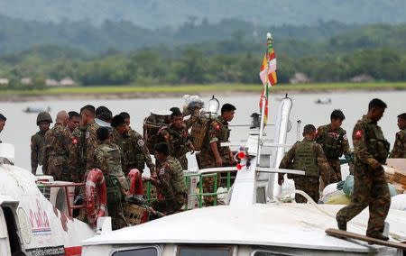 FILE PHOTO: Myanmar soldiers arrive to Buthidaung jetty after Arakan Rohingya Salvation Army's (ARSA) attacks, at Buthidaung, Myanmar August 29, 2017. RETUERS/Soe Zeya Tun