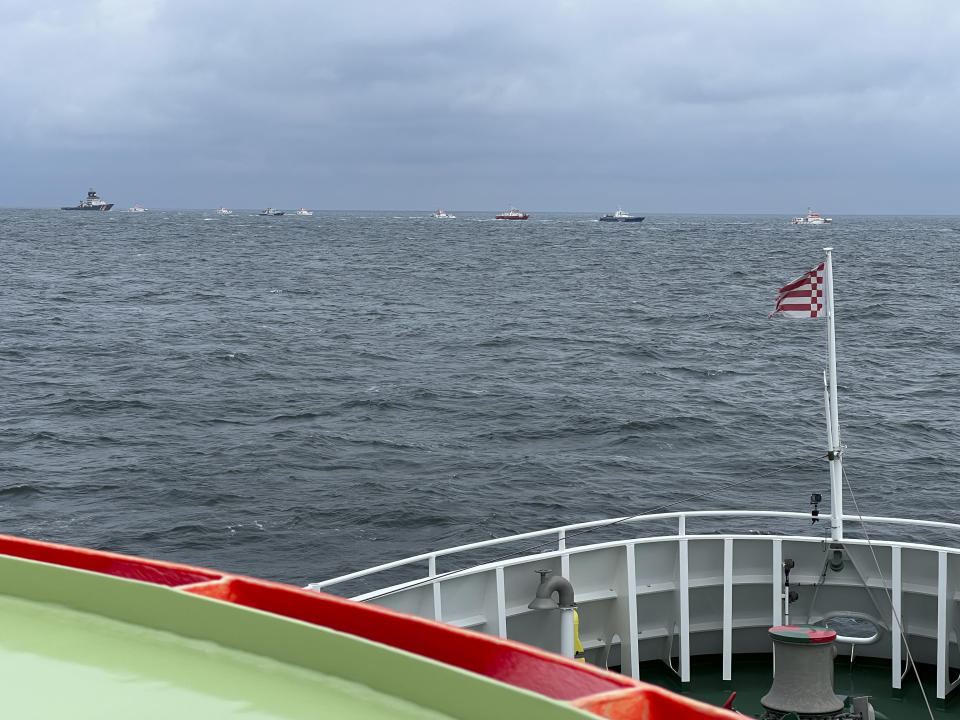 This photo taken on Tuesday, Oct. 24, 2023 in the region of the island Helgoland, in the North Sea and provided by the Seenotretter - DGzRS, shows the search for the missing seamen of the freighter 'Verity', which sank after a collision early Tuesday. German authorities say two cargo ships have collided in the North Sea off the German coast and one vessel sank. At least one sailor died and rescuers were trying to find another four. Germany’s Central Command for Maritime Emergencies said the Polesie and Verity ships collided early Tuesday about 22 kilometers or 14 miles southwest of the island of Helgoland. (Seenotretter - DGzRS via AP)