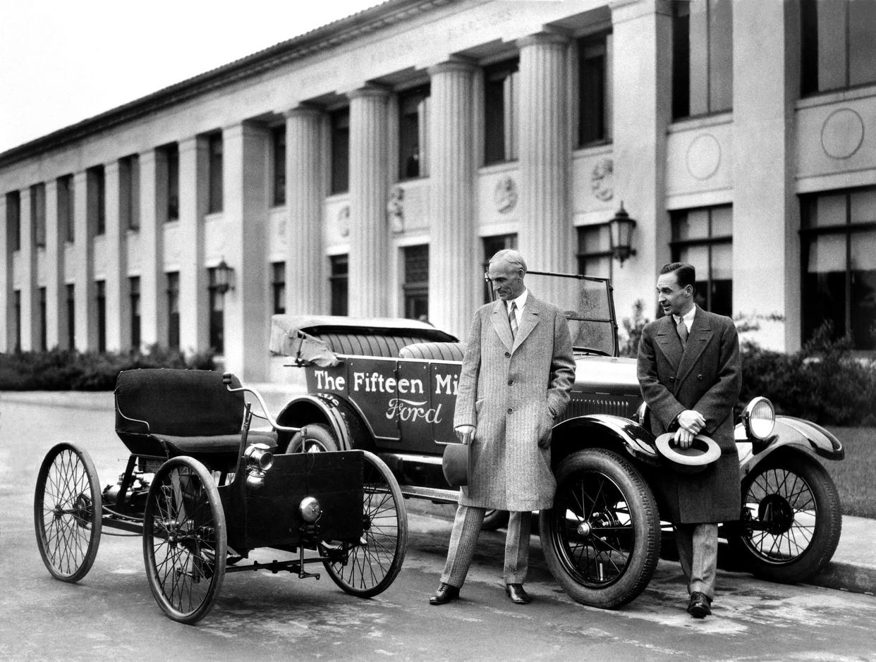 Henry and Edsel Ford with Quadricycle and the fifteenth million Ford Model T in 1927.