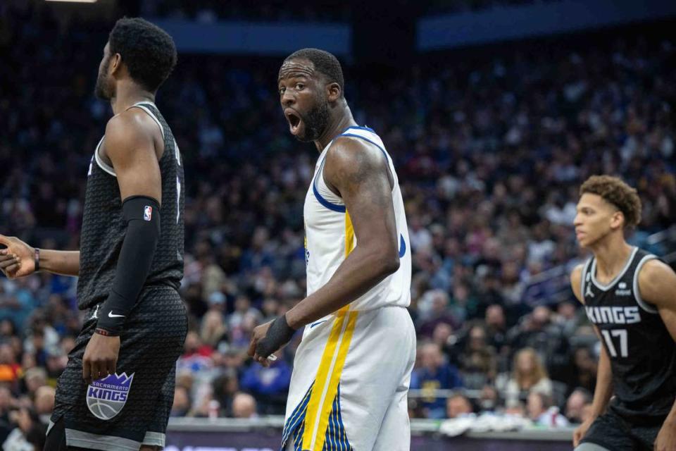 Golden State Warriors forward Draymond Green (23) reacts to a call during an NBA game between the Sacramento Kings and the Golden State Warriors on April 7 at Golden 1 Center.