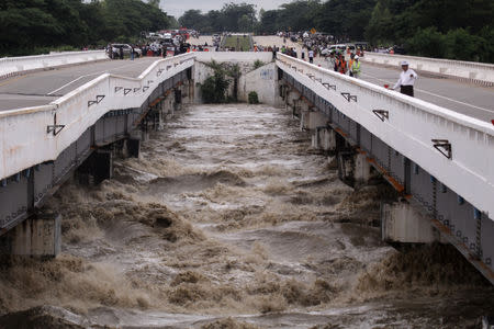 Swar creek bridge is seen damaged after flooding at the Yangon-Mandalay express highway in Swar township, Myanmar, August 29, 2018. REUTERS/7Day News