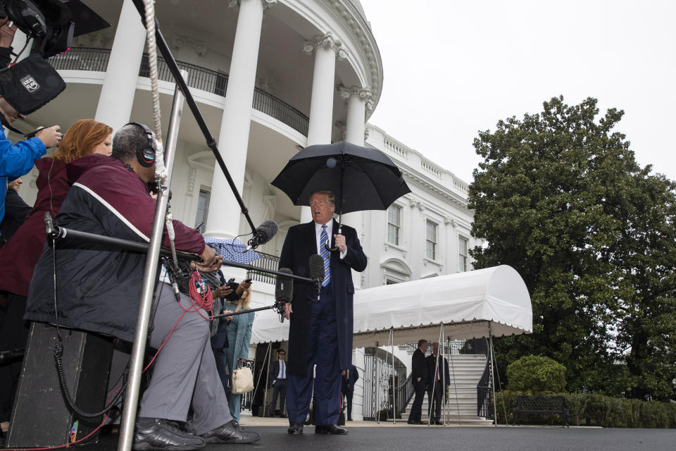 President Donald Trump speaks about the coronavirus as he walks to Marine One to depart the White House, Saturday, March 28, 2020, in Washington. Trump is en route to Norfolk, Va., for the sailing of the USNS Comfort, which is headed to New York. (AP Photo/Alex Brandon)