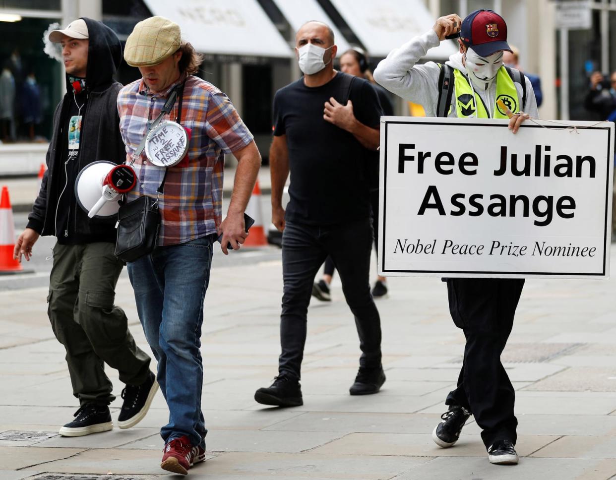 Image: Supporters of WikiLeaks founder Julian Assange arrive at the Old Bailey, the Central Criminal Court ahead of a hearing to decide whether Assange should be extradited to the United States, in London, Britain (Peter Nicholls / Reuters)