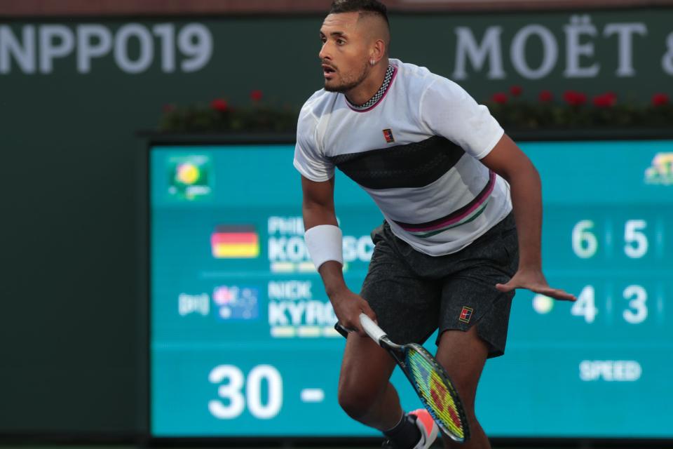 Nick Kyrgios watches a shot from Philipp Kohlschreiber in the second set of their match at the BNP Paribas Open, Indian Wells, Calif., March 9, 2019.