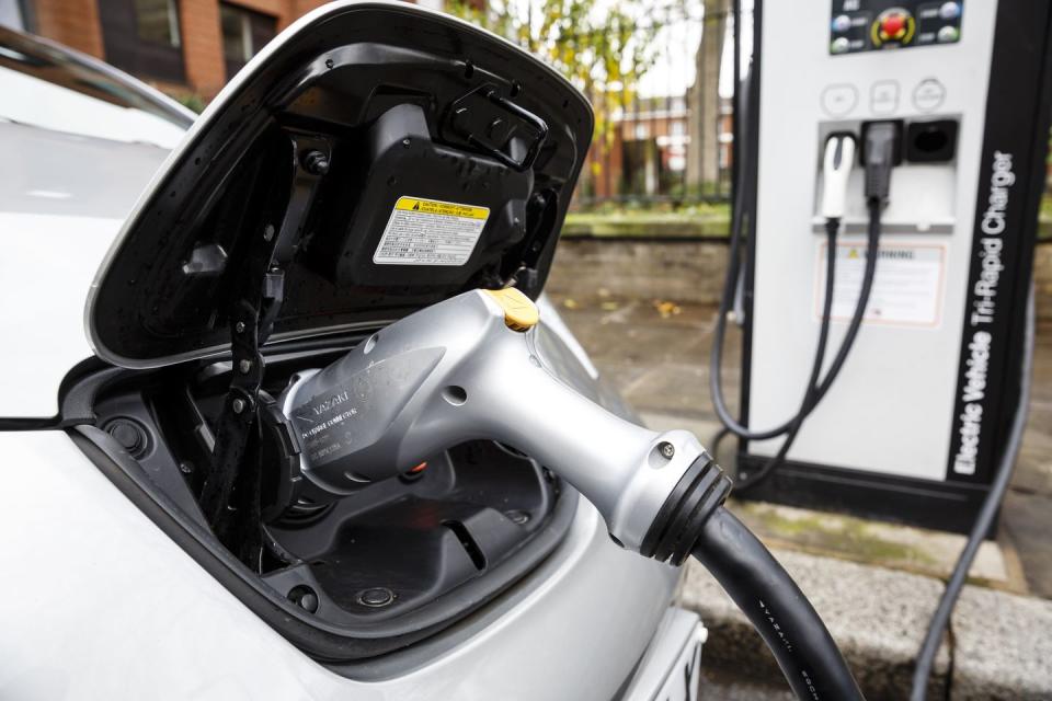 go ultra low electric vehicle on charge on a london street