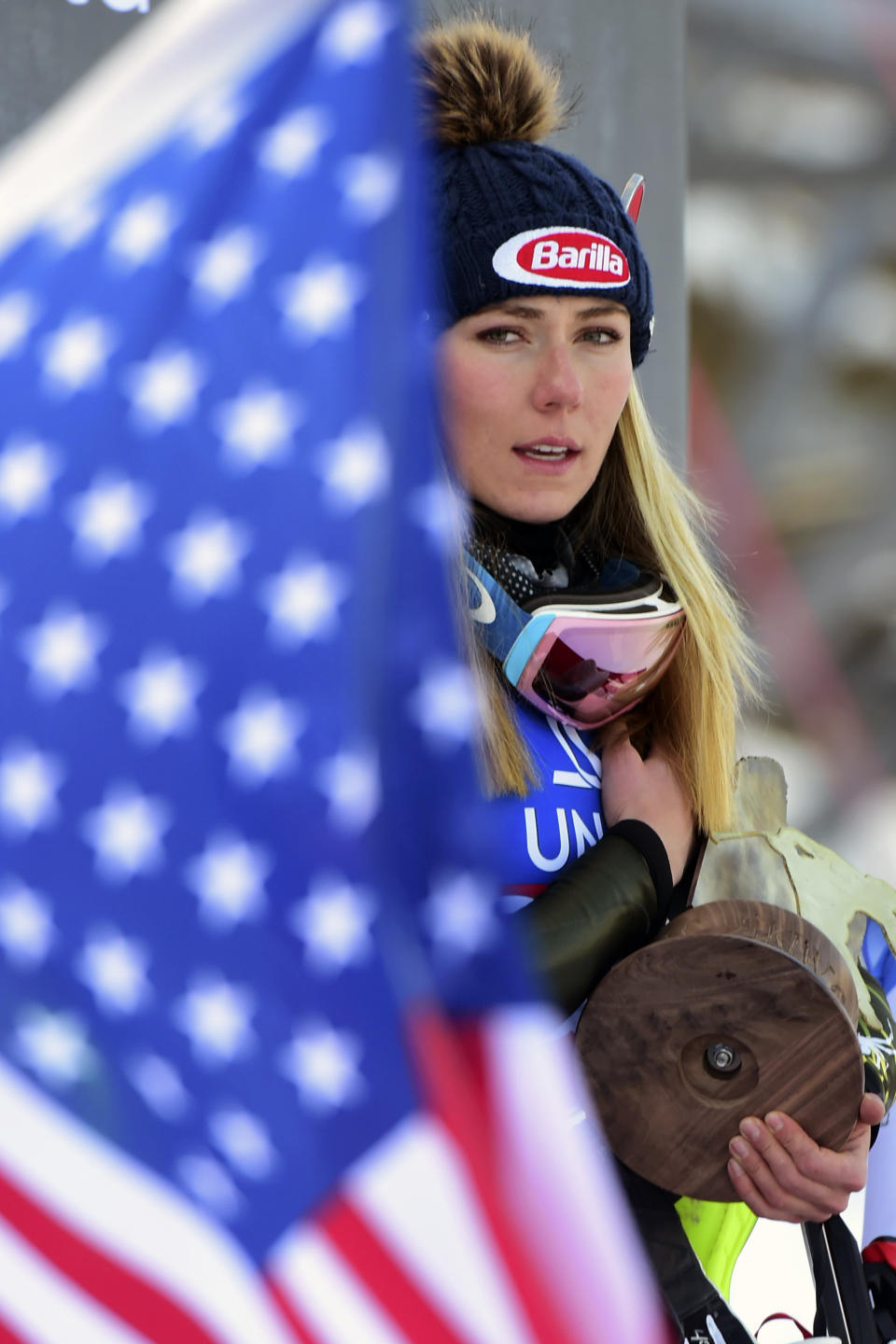 FILE - In this Dec. 29, 2019, file photo, first placed United States' Mikaela Shiffrin celebrates on the podium after completing a women's World Cup slalom ski race in Lienz, Austria. The Associated Press spoke to more than two dozen athletes from around the globe -- representing seven countries and 11 sports -- to get a sense of how concerned or confident they are about resuming competition. “If the tests don’t come back for a couple of days and what-not, how does that really work?” said ski racer Mikaela Shiffrin, a two-time Olympic gold medalist and three-time World Cup overall champion. “It’s good to know if you test positive or negative. But if we’re talking about being tested today so we can race tomorrow, but the results don’t come back for two days, it doesn’t really help.” (AP Photo/Pier Marco Tacca, File)
