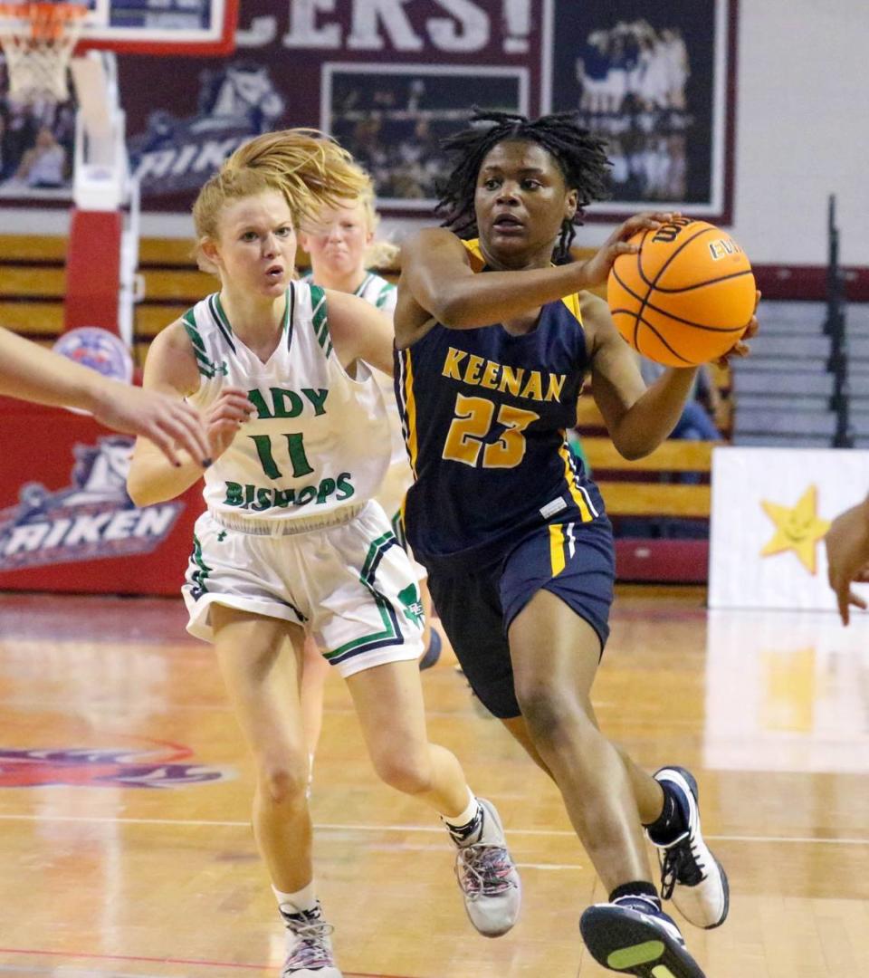 Bishop England’s Alli Dominiak chases Keenan’s MiLaysia Fulwiley (23) downcourt during the 3A state championship game at the USC Aiken Convocation Center on Friday, March 5, 2021.