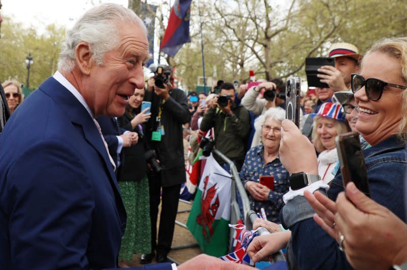 King Charles III shakes members of the public's hands as he did an impromptu walkabout on The Mall the day before his May 2023 coronation in London. File photo by Hugo Philpott/UPI