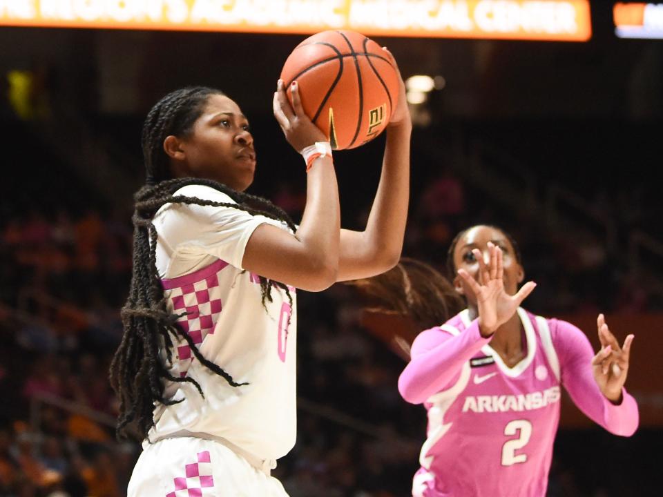 Tennessee's Jewel Spear (0) with the shot attempt while guarded by Arkansas' Samara Spencer (2) during an NCAA college basketball game on Monday, February 12, 2024 in Knoxville, Tenn.