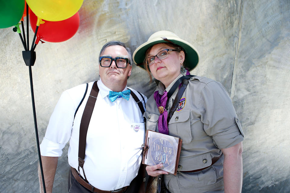 <p>Cosplayers dressed as Ellie and Carl from <em>Up</em> at Comic-Con International on July 20 in San Diego. (Photo: Mario Tama/Getty Images) </p>