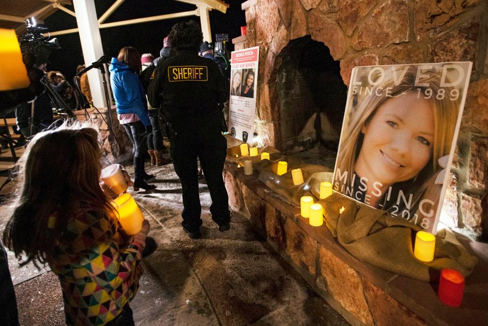 In this Dec. 13, 2018 file photo, community members hold a candlelight vigil for Kelsey Berreth under the gazebo of Memorial Park in Woodland Park, Colorado. Authorities say they arrested the fiance of the Colorado woman who was last seen on Thanksgiving. Teller County sheriff's Cmdr. Greg Couch said Patrick Frazee was arrested Friday, Dec. 21, 2018, at his home in Florissant, Colorado.