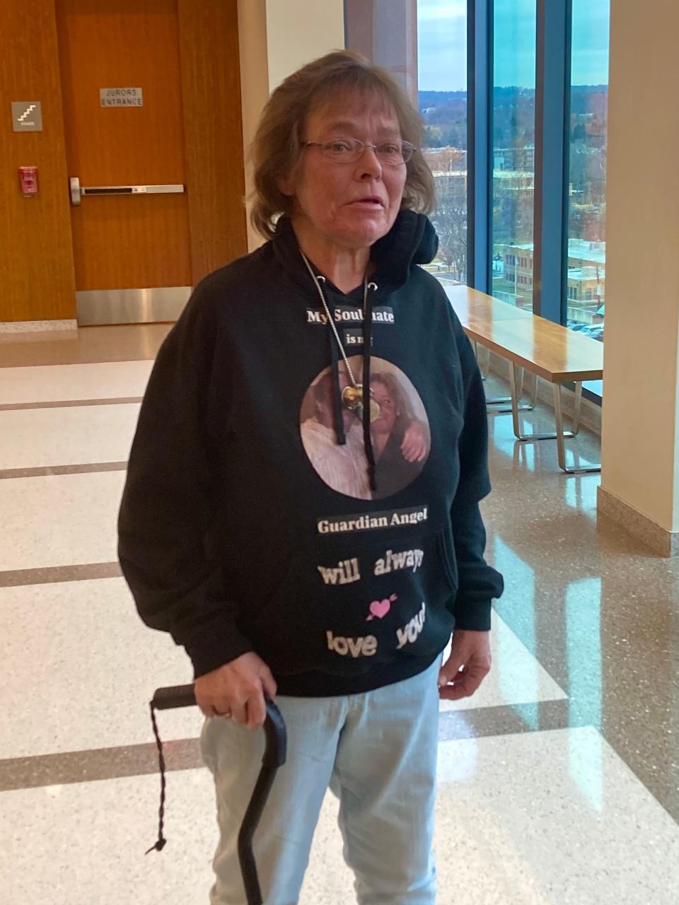 John Dugan's fiancée Christine Mezzatenta wearing a sweatshirt with his image on it at the sentencing Nov. 21, 2023 of Kevin Baker Jr., who struck and killed Dugan, 65, then fled the scene on Christmas Eve 2021.
