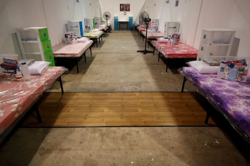 A view of beds at Changi Exhibition Centre which has been repurposed into a community isolation facility that will house recovering or early COVID-19 patients with mild symptoms, in Singapore