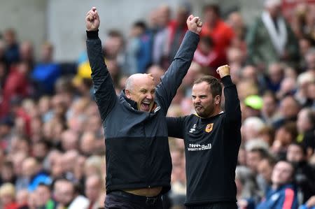 Britain Soccer Football - Swansea City v Hull City - Premier League - Liberty Stadium - 20/8/16 Hull City caretaker manager Mike Phelan celebrates scoring their goal Reuters / Rebecca Naden