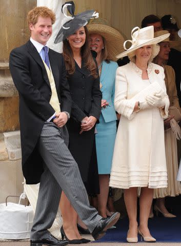 <p>Anwar Hussein/Getty Images</p> Prince Harry, Kate Middleton and Camilla in 2008