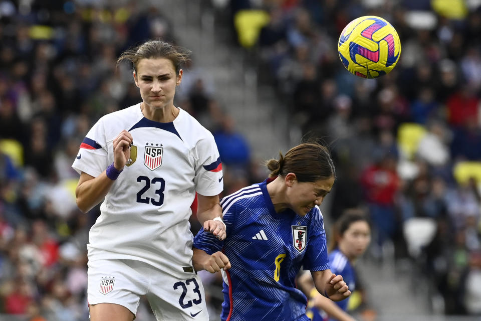 United States defender Emily Fox (23) heads the ball against Japan midfielder Fuka Nagano (8) during the second half of a SheBelieves Cup women's soccer match Sunday, Feb. 19, 2023, in Nashville, Tenn. (AP Photo/Mark Zaleski)