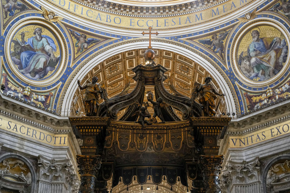 A view of the top part of the 17th century, 95ft-tall bronze canopy by Giovan Lorenzo Bernini surmounting the papal Altar of the Confession in St. Peter's Basilica at the Vatican, Wednesday, Jan. 10, 2024. Vatican officials unveiled plans Thursday, Jan.11, for a year-long, 700,000 euro restoration of the monumental baldacchino, or canopy, of St. Peter's Basilica, pledging to complete the first comprehensive work on Bernini's masterpiece in 250 years before Pope Francis' big 2025 Jubilee. (AP Photo/Andrew Medichini)