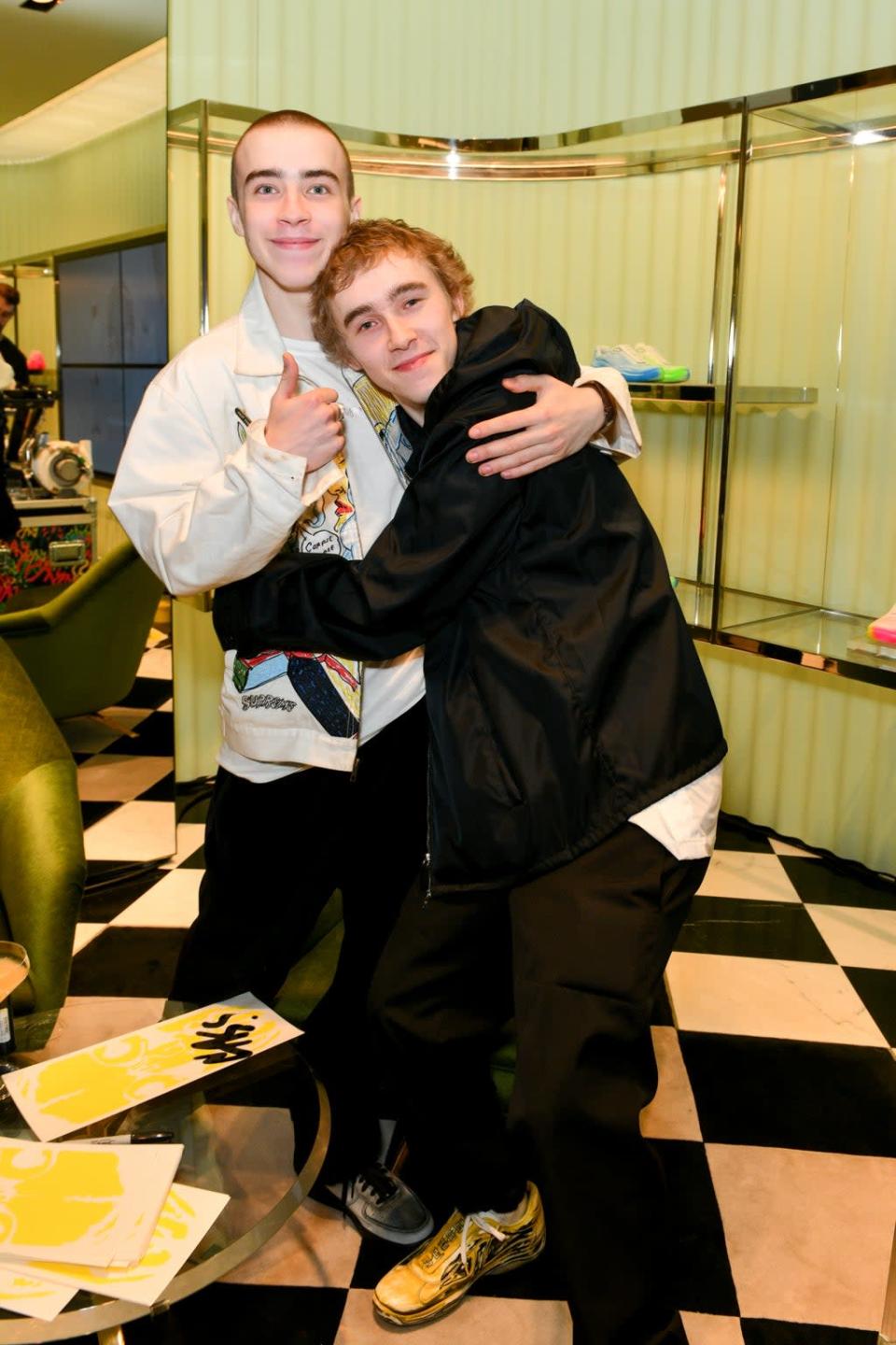 Cyrus Hirst and Cassius Hirst embrace at the Cass x Prada launch party (Dave Benett/Getty Images for Prada)