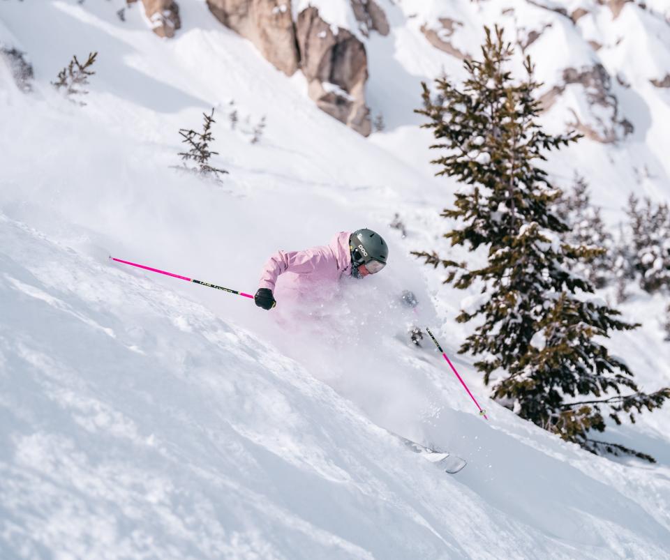 Rockford native Katie White, shown skiing some deep powder, was recently named to the Professional Ski Instructors of America 2024-28 National Team.