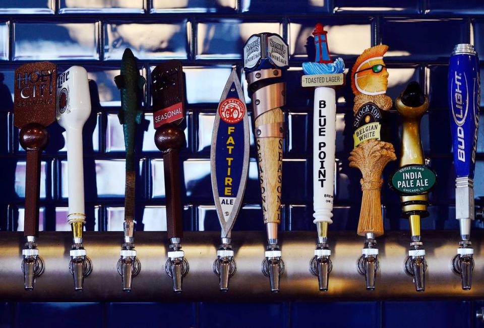 The beer taps at Poseidon Coastal Cuisine & Rooftop Bar.