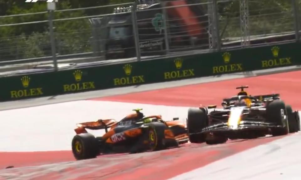 <span>Lando Norris (left) and Max Verstappen end up off the track during their battle at the Austrian Grand Prix.</span><span>Photograph: Sky F1</span>