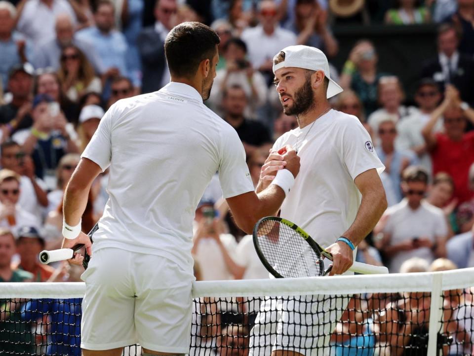 Fearnley pushed Djokovic but was beaten 6-3 6-4 5-7 7-5 (REUTERS)