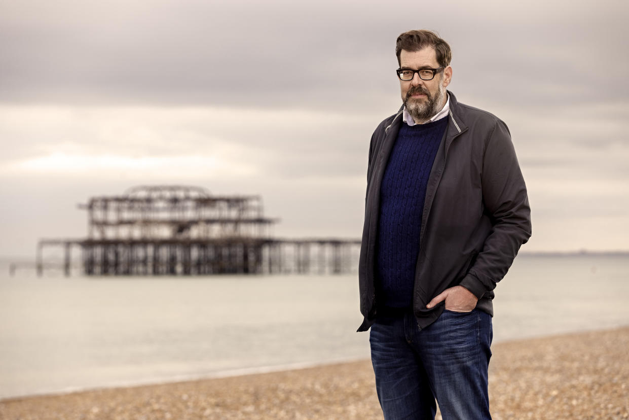  Richard Osman on Brighton Beach. 