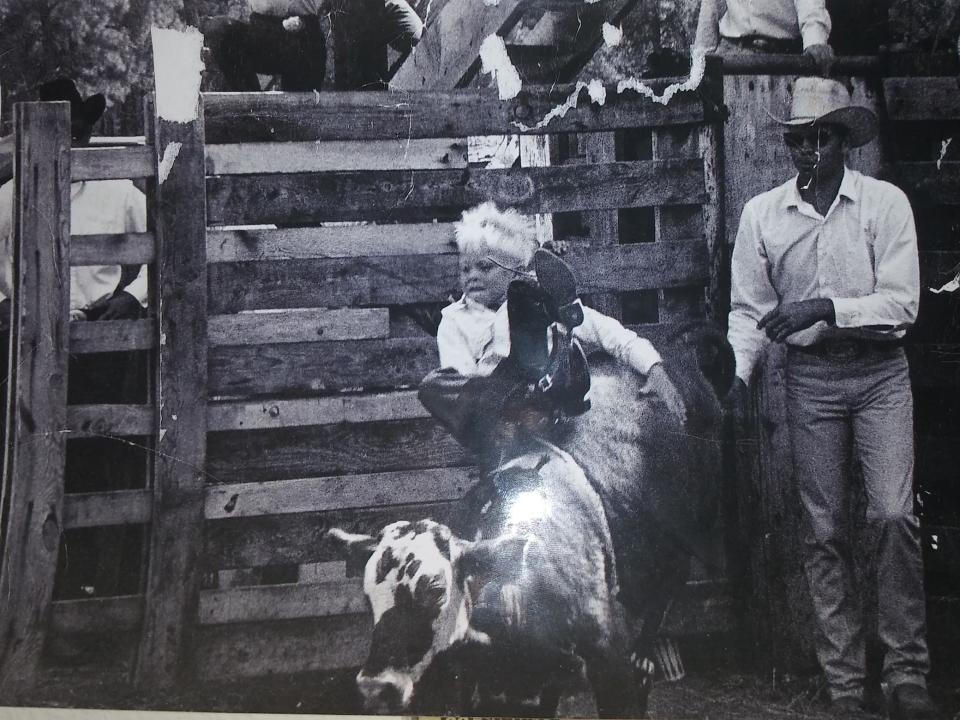 Shaun Hardt, age 4, rides a bull. His father, Gary, has a rodeo named after him in Payson called the "Gary Hardt Memorial Rodeo."