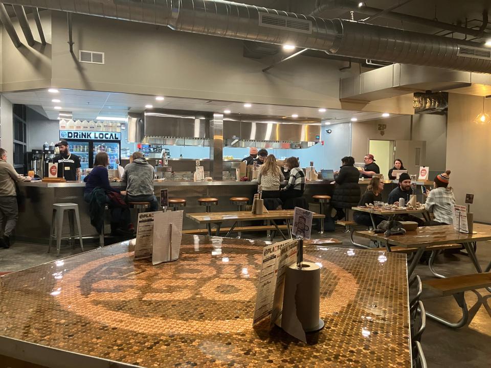 Patrons enjoy wings, sandwiches, salads and more at Boss ChickNBeer's Cuyahoga Falls location, the Cleveland chain's first in Summit County.