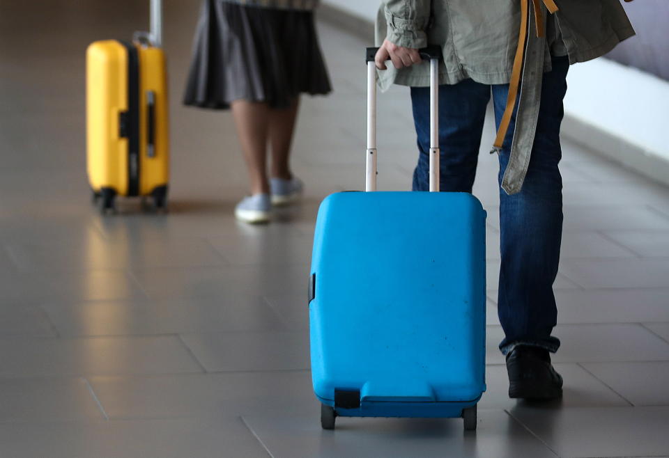 ST PETERSBURG, RUSSIA - APRIL 19, 2019: Passengers with suitcases at Pulkovo International Airport. Valery Sharifulin/TASS (Photo by Valery Sharifulin\TASS via Getty Images)