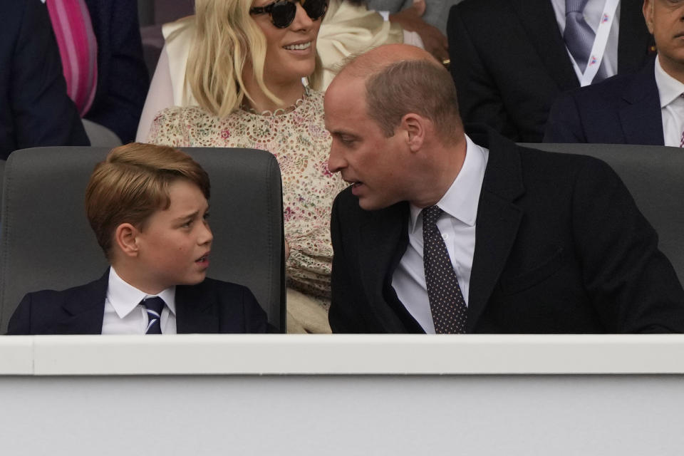 Prince George and the Duke of Cambridge during the Platinum Jubilee Pageant in front of Buckingham Palace, London, on day four of the Platinum Jubilee celebrations. Picture date: Sunday June 5, 2022.