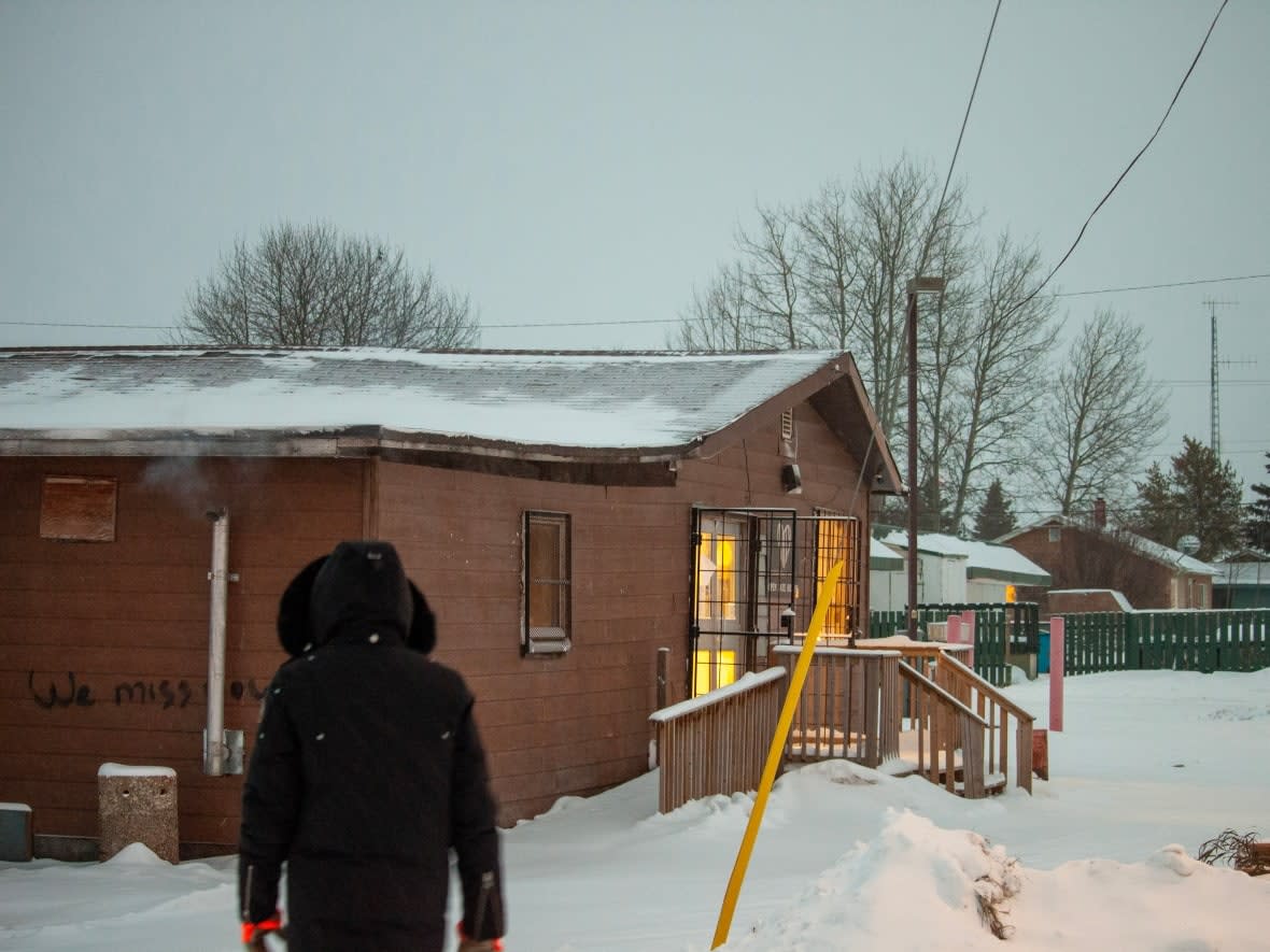 The warming shelter in Fort Simpson, housed in the former Unity Store building, is an outbreak site, according to the Office of the Chief Public Health Officers Jan. 25 update to public exposure locations.  (Hannah Paulson/CBC News - image credit)