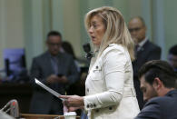 Assembly Republican Leader Marie Waldron, of Escondido, urges lawmakers to reject a measure to give new wage and benefit protections at the so-called gig economy companies like Uber and Lyft, during the Assembly session in Sacramento, Calif., Wednesday, Sept. 11, 2019. The bill AB5, by Assemblywoman Lorenza Gonzalez, D-San Diego, was approved and now goes to the governor, who has said he supports it. (AP Photo/Rich Pedroncelli)