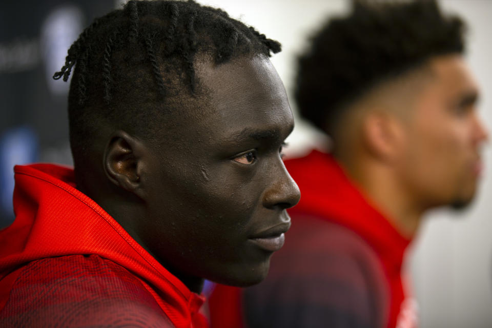 Utah's Both Gach, left, and Timmy Allen speak during the Pac-12 NCAA college basketball media day, in San Francisco, Tuesday, Oct. 8, 2019. (AP Photo/D. Ross Cameron)