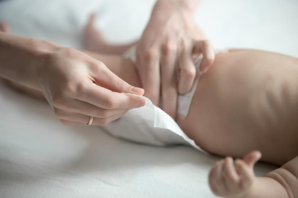 Would you pay someone to change your baby’s nappy? [Photo: Getty]