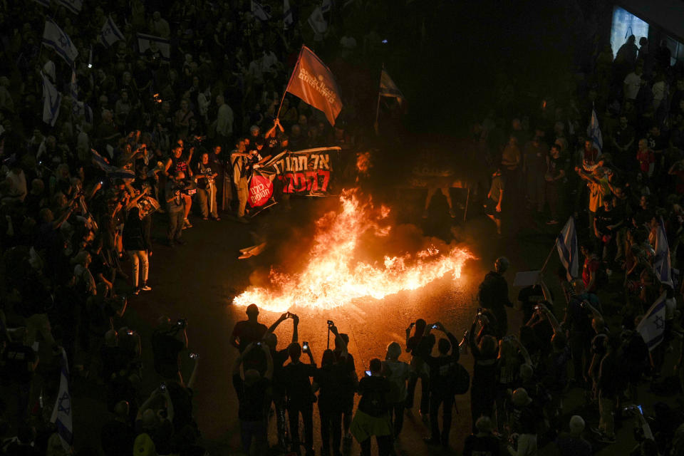 Relatives and supporters of the Israeli hostages held in the Gaza Strip by the Hamas militant group call for their release during a protest in Tel Aviv, Monday, April 29, 2024. (AP Photo/Ohad Zwigenberg)