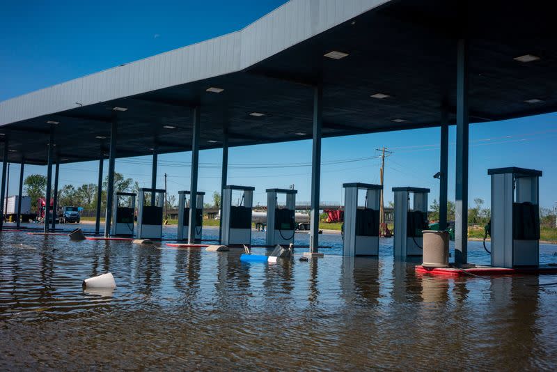 FILE PHOTO: A gas station remains flooded from Hurricane Delta in Lake Charles