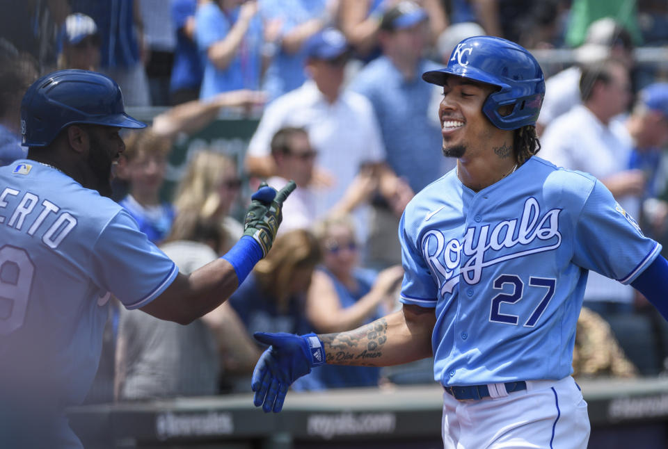 Kansas City Royals' Aldaberto Modesi, right, is congratulated by teammate Hanser Alberto, left, after hitting a home run against the Detroit Tigers during the second inning of a baseball game in Kansas City, Mo., Wednesday, June 16, 2021. (AP Photo/Reed Hoffmann)