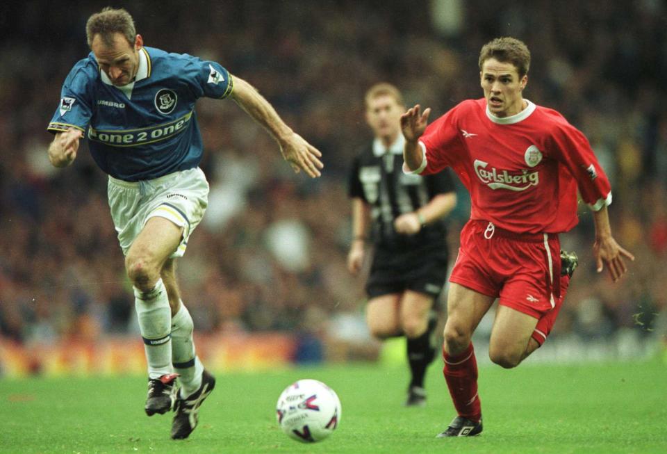 Michael Owen of Liverpool battles with Dave Watson of Everton during the Everton v Liverpool FA Carling Premier League match at Goodison Park - Getty Images/Shaun Botterill