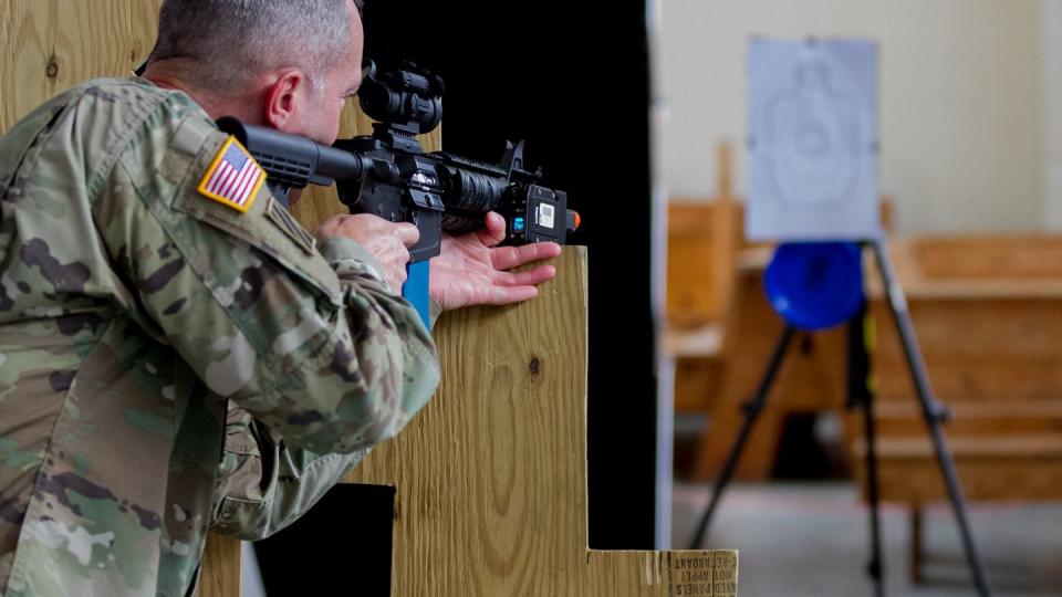 A paratrooper from the 82nd Airborne Division demonstrates marksmanship using laser technology at the Monitoring and Assessing Soldier Tactical Readiness and Effectiveness (MASTR-E) exhibition at Fort Bragg, North Carolina, on June 20, 2018 (Sgt. Gin-Sophie De Bellotte)